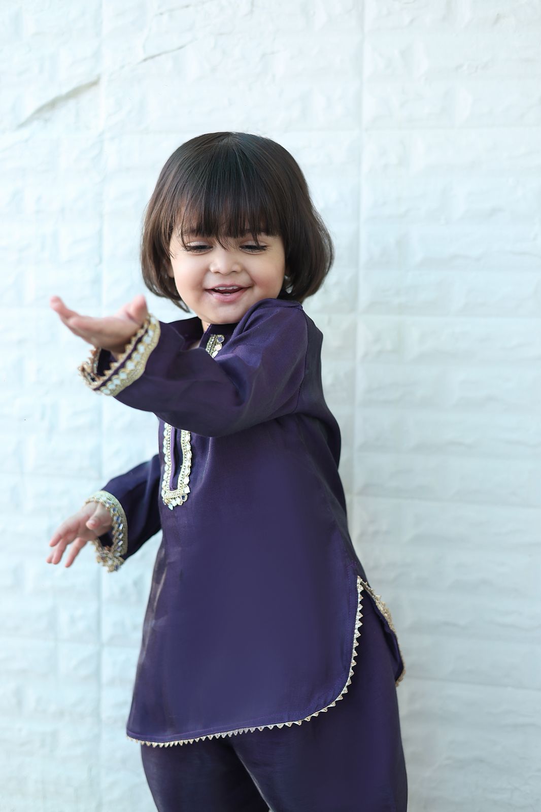 Hoor kurta set close-up showing gold zari and mirror work detailing