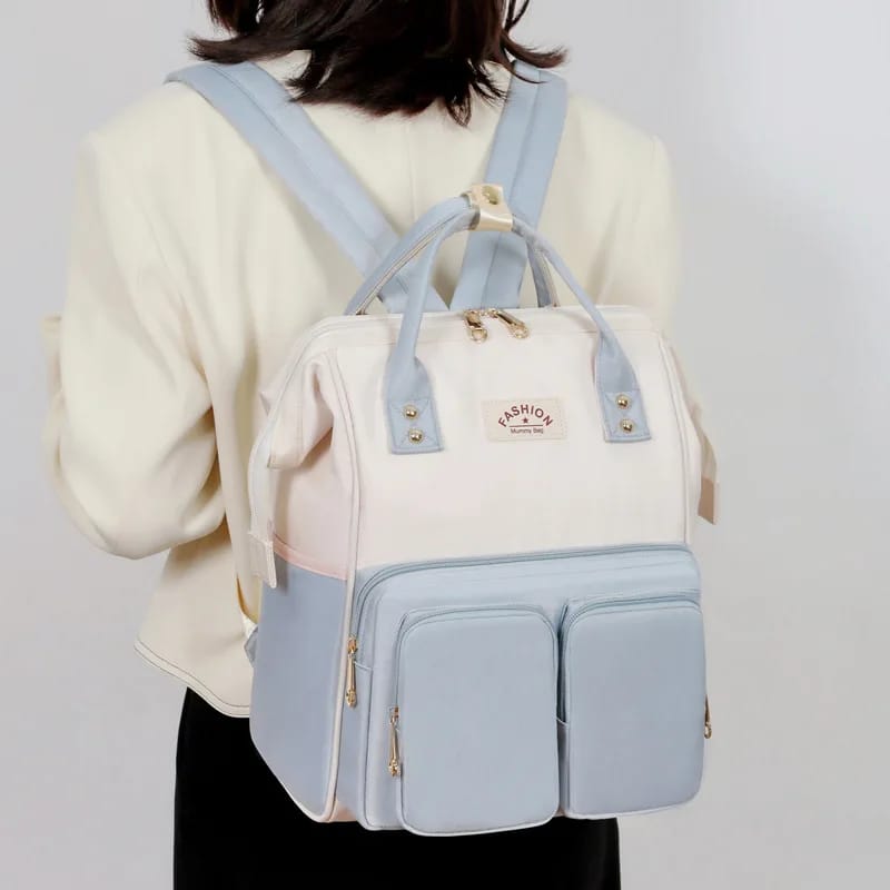 MotherCare Elite Carry Diaper Backpack in Purple colorway
