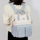 MotherCare Elite Carry Diaper Backpack in Purple colorway